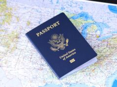 10-Year US Visa: The Rules Nobody Bothers to Read US visa stamp displayed over a world map, representing international travel and 10-year multiple-entry US tourist visa rules.