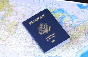 10-Year US Visa: The Rules Nobody Bothers to Read US visa stamp displayed over a world map, representing international travel and 10-year multiple-entry US tourist visa rules.